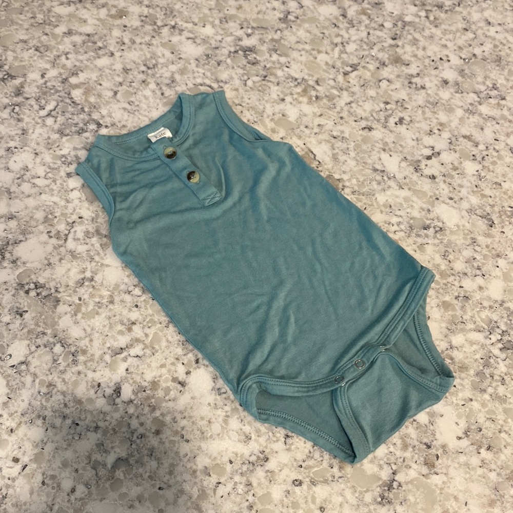 Excellent condition Kate Quinn onesie